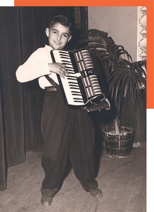 Young Robert Porco with  his chosen instrument, the accordion.