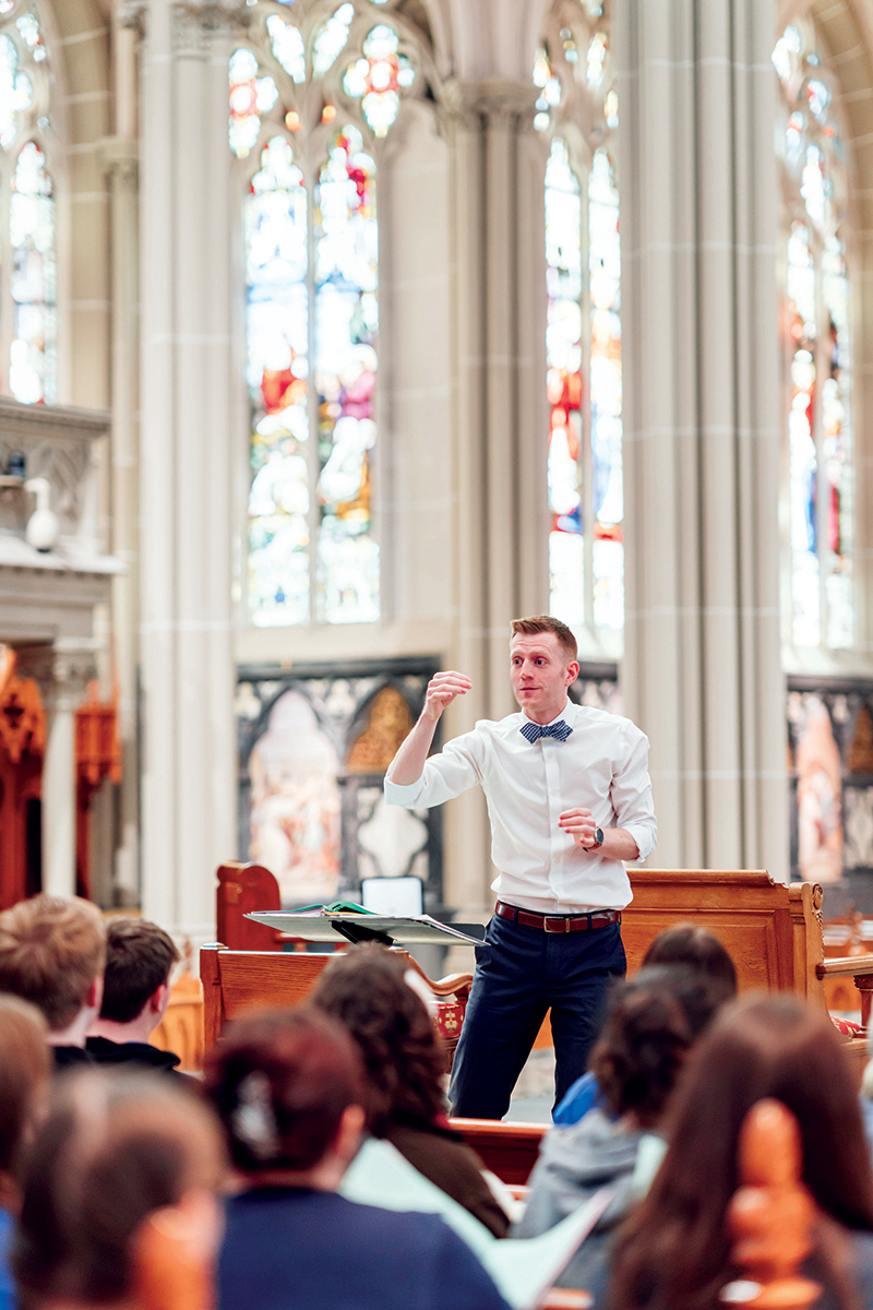 Matthew Swanson leads a May Festival Youth Chorus rehearsal in April 2022 at the Cathedral Basilica of the Assumption. 