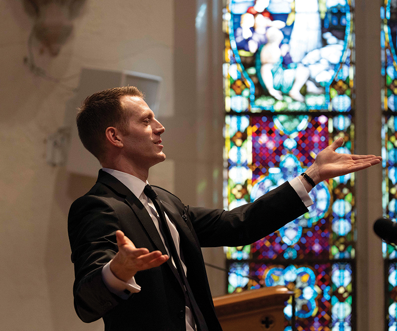 Director of Choruses Matthew Swanson conducts the May Festival Chamber Choir during a performance at Westwood First Presbyterian Church, October 2024. Credit: Charlie Balcom